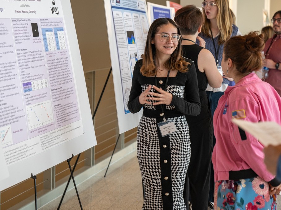 Students at a poster presentation