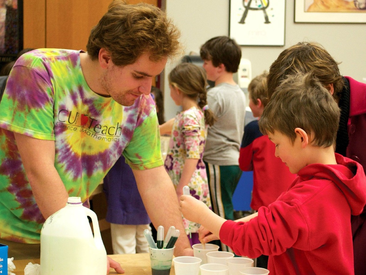 An instructor with elementary students