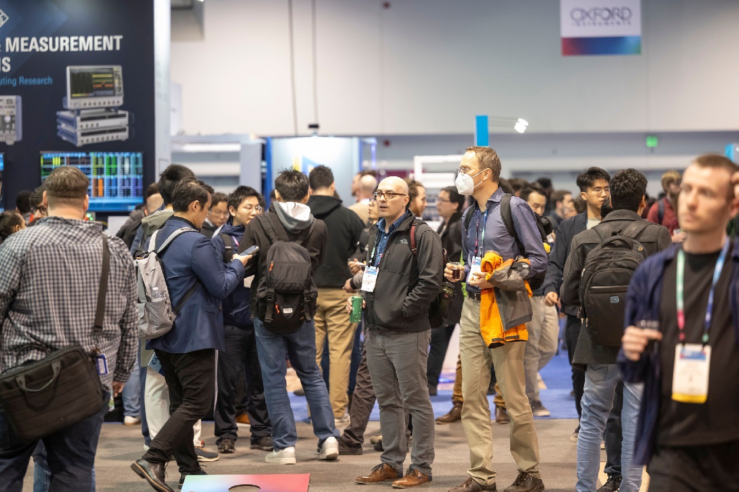 A crowd of attendees at the APS Global Physics Summit exhibit hall