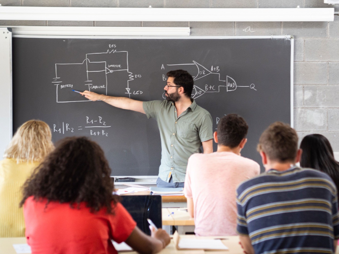 A teacher in front of a classroom