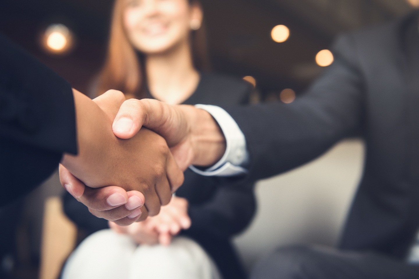 Two people shaking hands