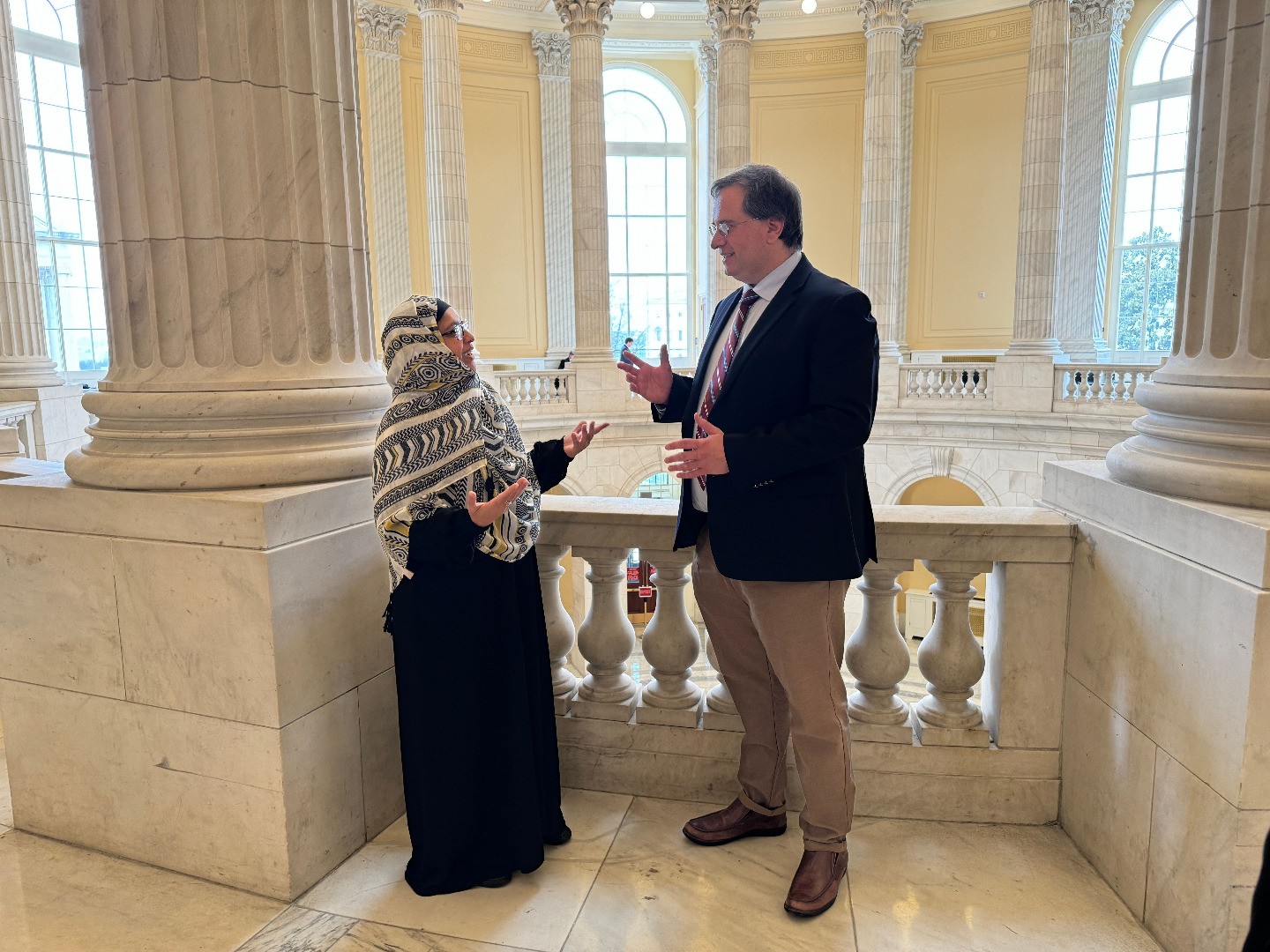 Two people speaking to each other at Congressional Visits Day