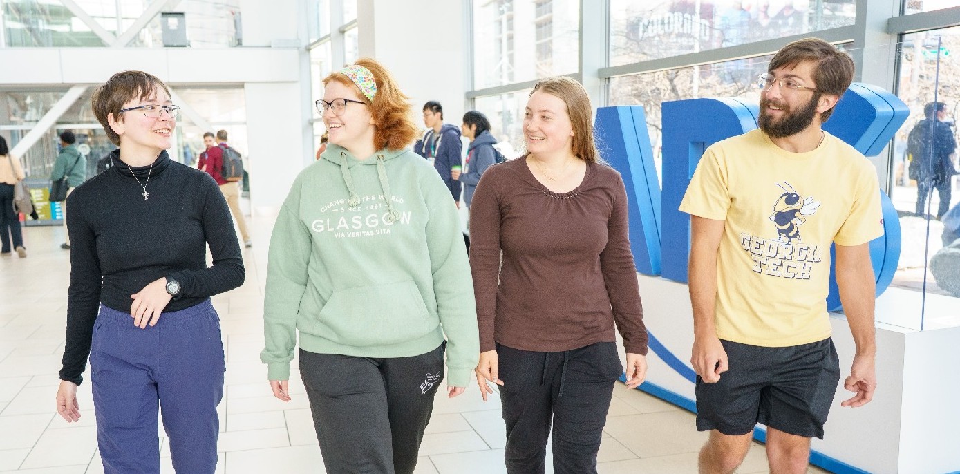 Student attendees walking down a hallway at the APS Global Physics Summit