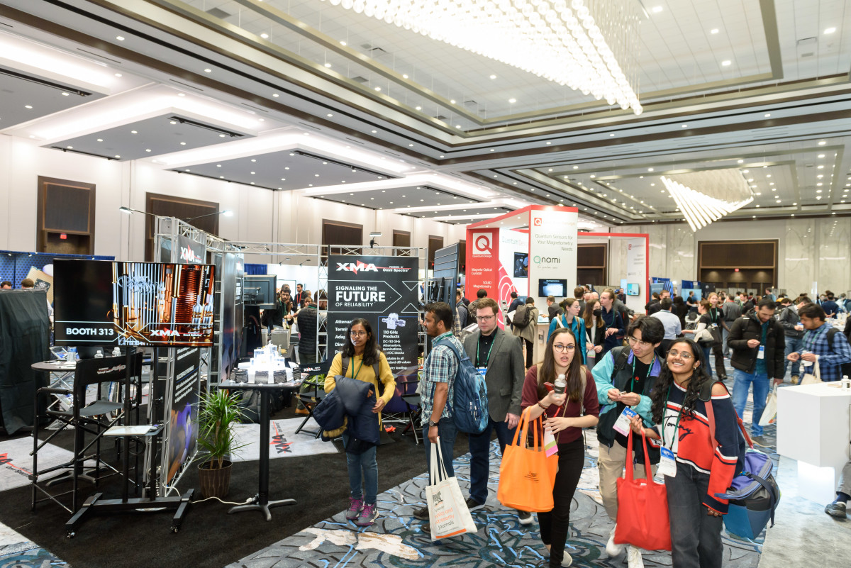 A crowd of people at the APS March Meeting 2023 exhibit hall