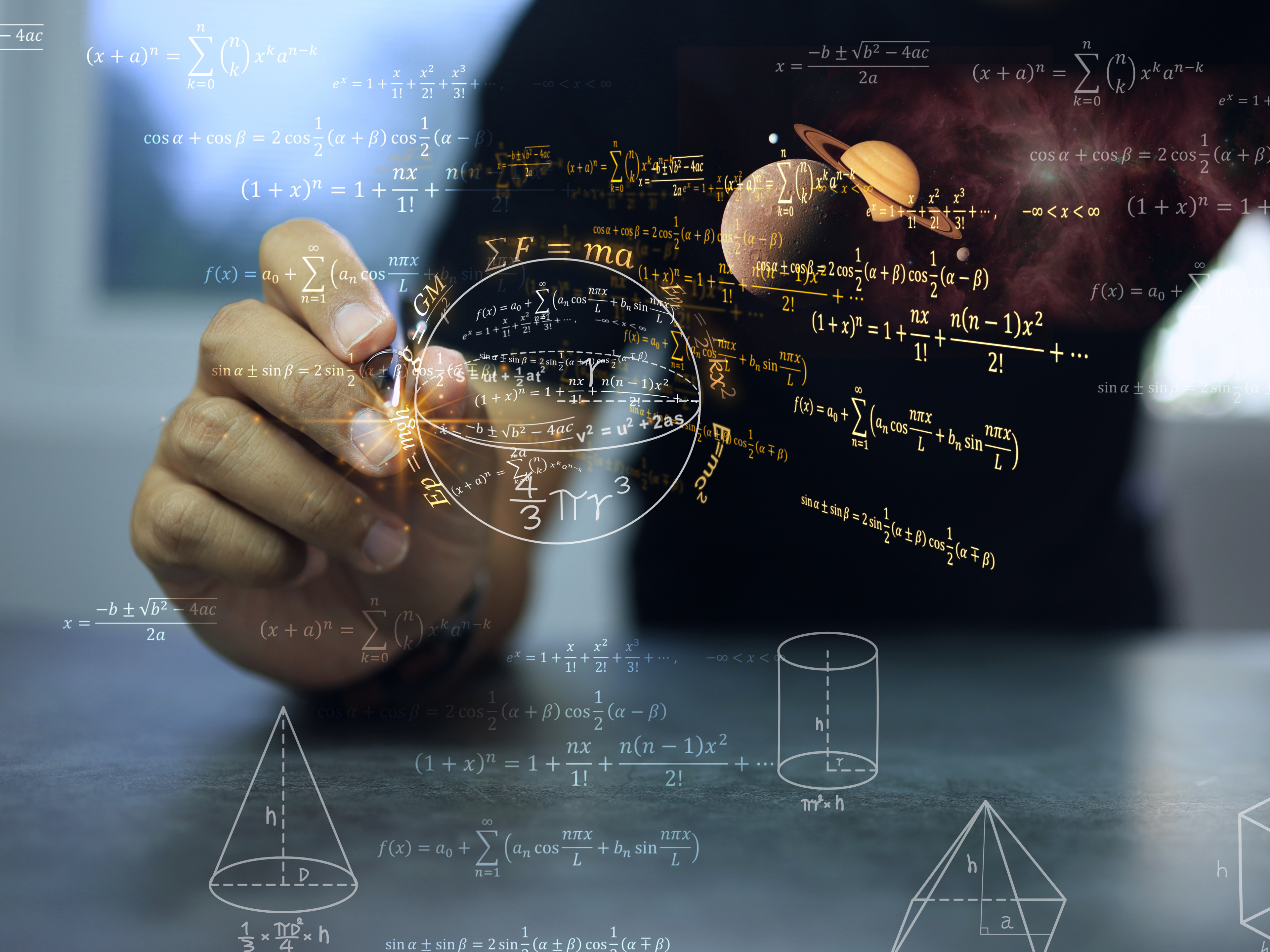 A person points to a 3-D graphical model with planets and formulas