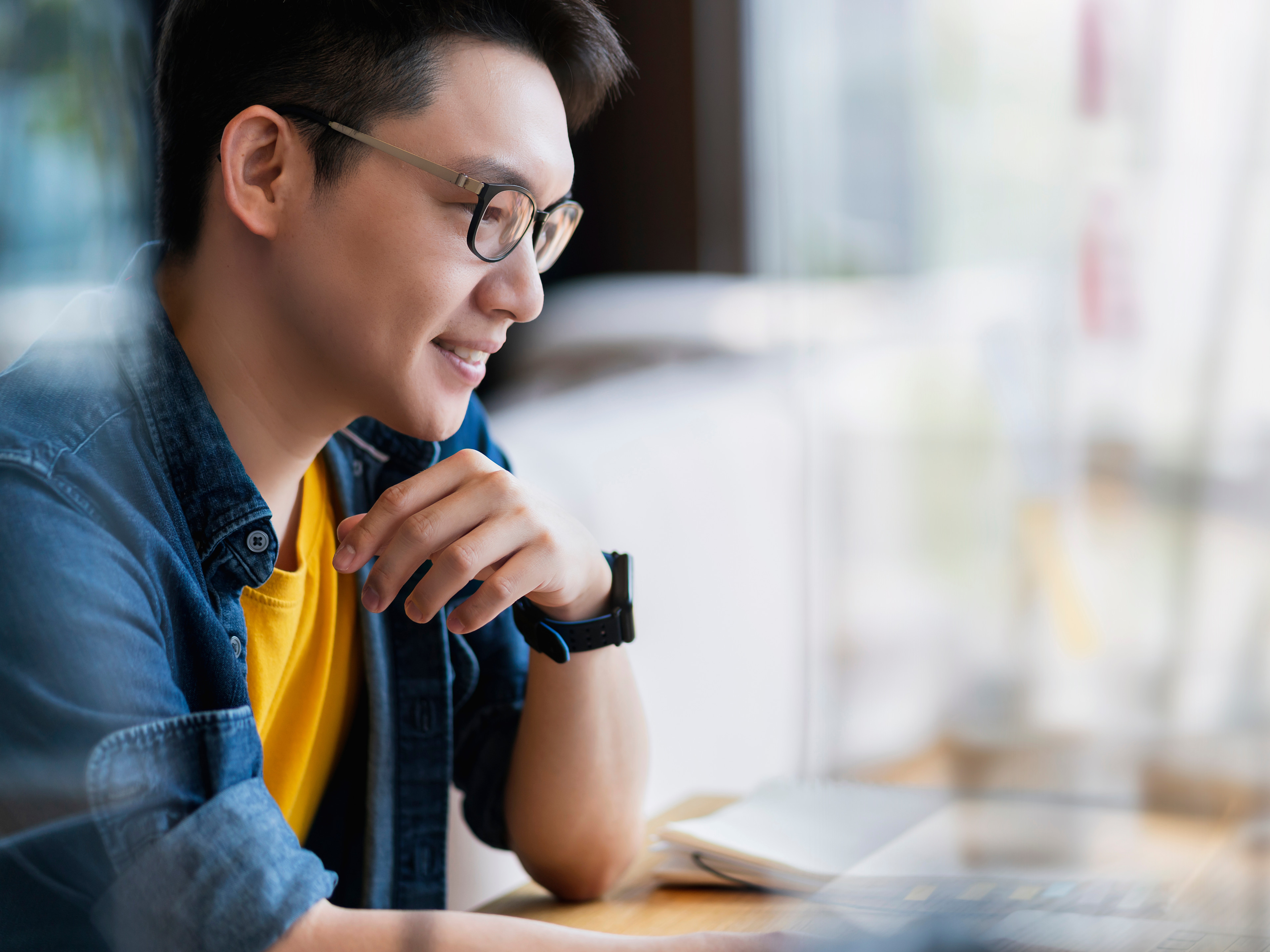 Researcher listening in on webinar